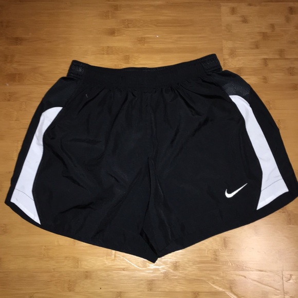 black nike shorts with white stripe